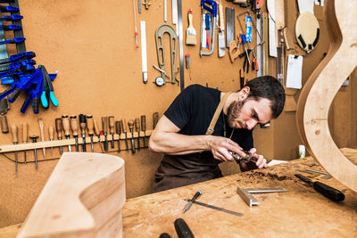 Man working on wood