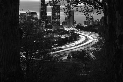High angle view of light trails on road at night