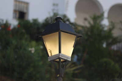 Low angle view of lamp post on street light