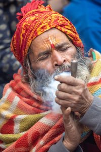 Portrait of a man drinking glass