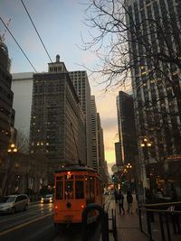 Traffic on city street at dusk