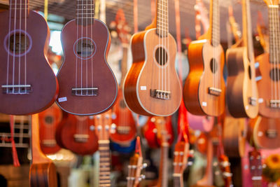 Guitars hanging for sale at store