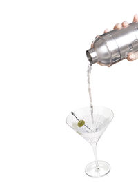 Close-up of wine glass against white background