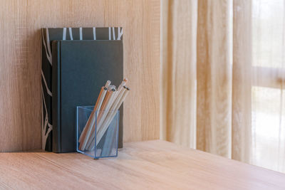 Close-up of objects on wooden table