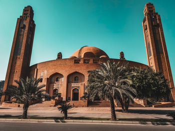 Low angle view of bahria mosque against sky