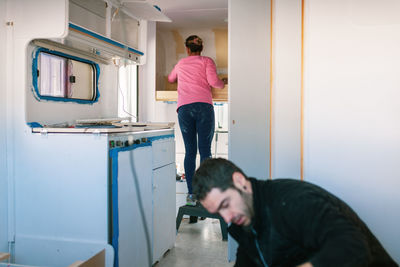 Couple in camper trailer