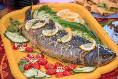 Close-up of fish served on table