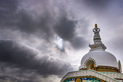 Low angle view of statue against sky