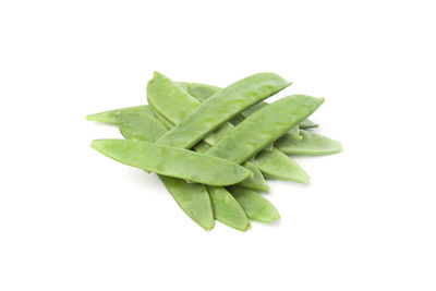 Close-up of green leaf over white background