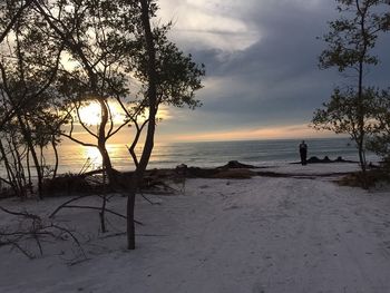 Scenic view of sea against cloudy sky