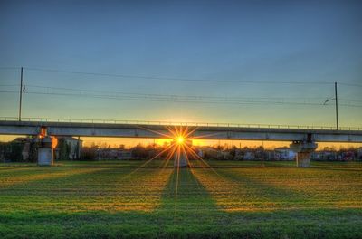 View of bridge over field