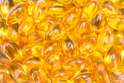 Full frame shot of yellow capsules