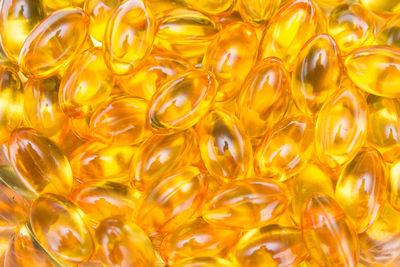 Full frame shot of yellow capsules