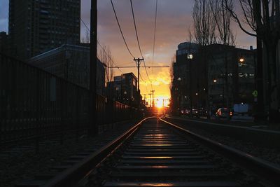 View of illuminated city at sunset