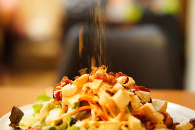 Close-up of meal served in plate on table