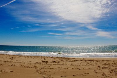 Scenic view of beach against sky