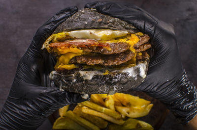 Midsection of man holding food