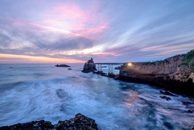 Scenic view of sea against sky during sunset