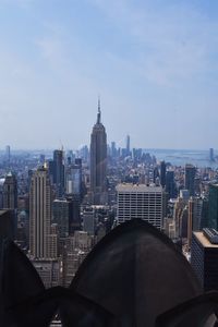 Modern buildings in city against sky