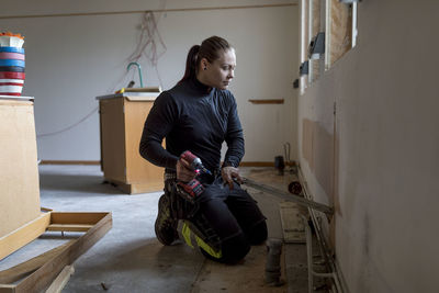 Woman renovating house