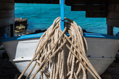 Close-up of boat moored at harbor