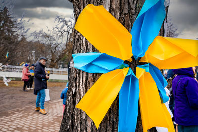 Protesters holding signs and flags participated at a - stand with ukraine.