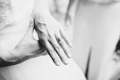 Close-up of couple holding hands