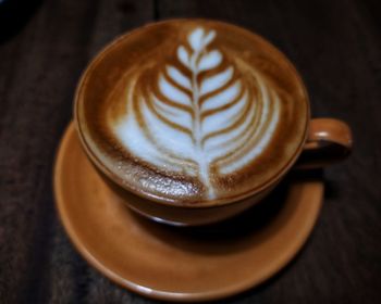 High angle view of cappuccino on table