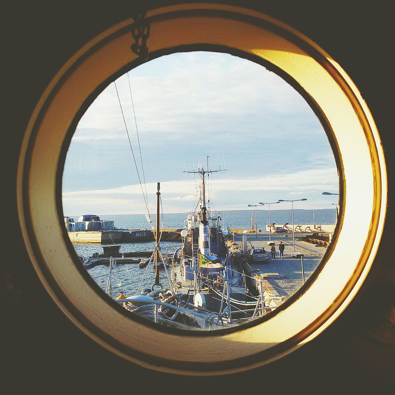 sky, water, indoors, window, sea, cloud - sky, nautical vessel, built structure, architecture, transparent, transportation, mode of transport, no people, glass - material, cloud, day, circle, building exterior, nature, boat