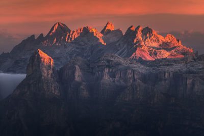 Scenic view of mountains against sky during sunset