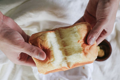 Close-up of hand holding food