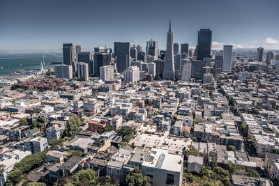 Aerial view of cityscape against clear sky