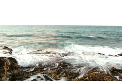 Scenic view of sea against clear sky