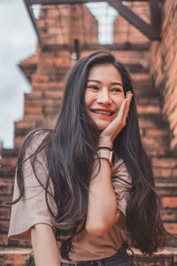Portrait of a smiling young woman