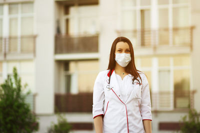 Young woman standing in city