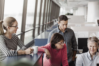 Multi-ethnic business people working in office