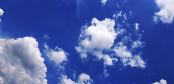 Low angle view of clouds in blue sky