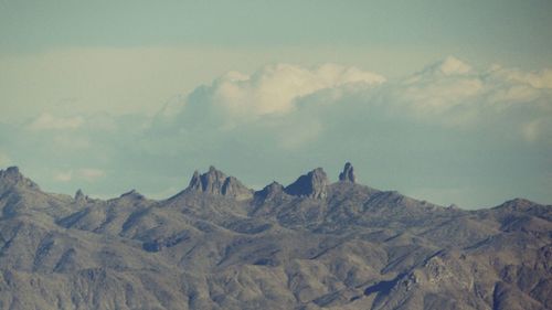 Panoramic view of mountains against sky