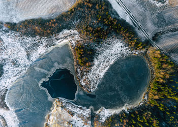 High angle view of water flowing through rocks