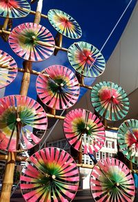 Low angle view of pinwheel toys for sale at market