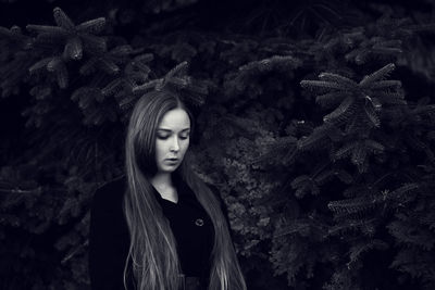 Portrait of a beautiful young woman looking away