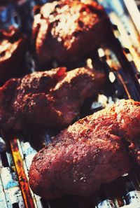 Close-up of meat on barbecue grill