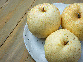 High angle view of apples on table