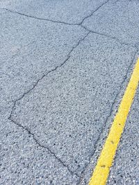 High angle view of cracked road