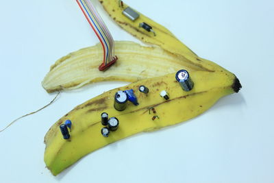 Close-up of bananas against white background