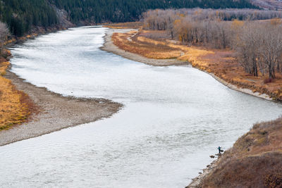 Scenic view of lake in forest during winter