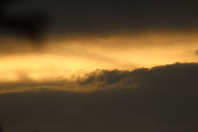 Low angle view of cloudy sky during sunset