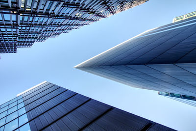 Low angle view of skyscrapers against clear sky