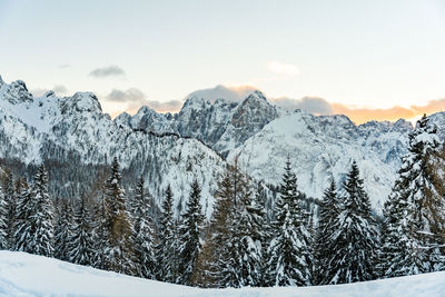 Scenic view of snowcapped mountains against clear sky