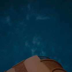 Low angle view of building against sky at night